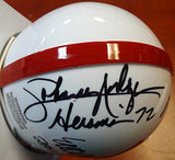 ERIC CROUCH, MIKE ROZIER & JOHNNY RODGERS AUTOGRAPHED NEBRASKA CORNHUSKERS MINI HELMET HEISMAN WINNERS WITH INSCRIPTIONS PSA/DNA ITP STOCK #103895