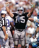 Howie Long Autographed Oakland Raiders 8x10 Photo Arms Up JSA